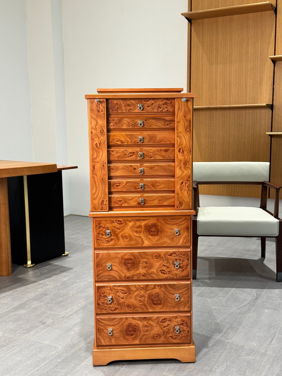 Closed jewellery cabinet with figured burl drawer fronts