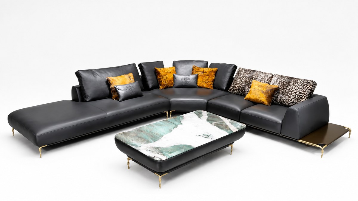 Dark corner sofa; low rounded table and side platform
