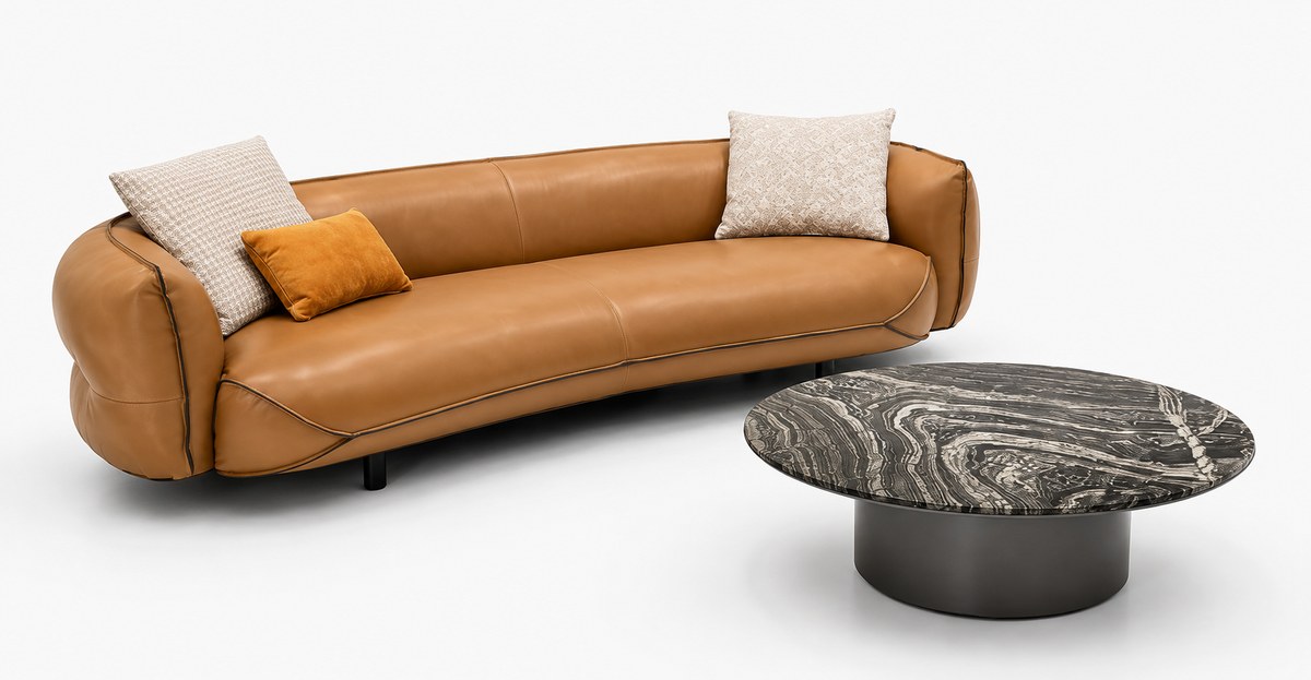 Cognac sofa; round veined table