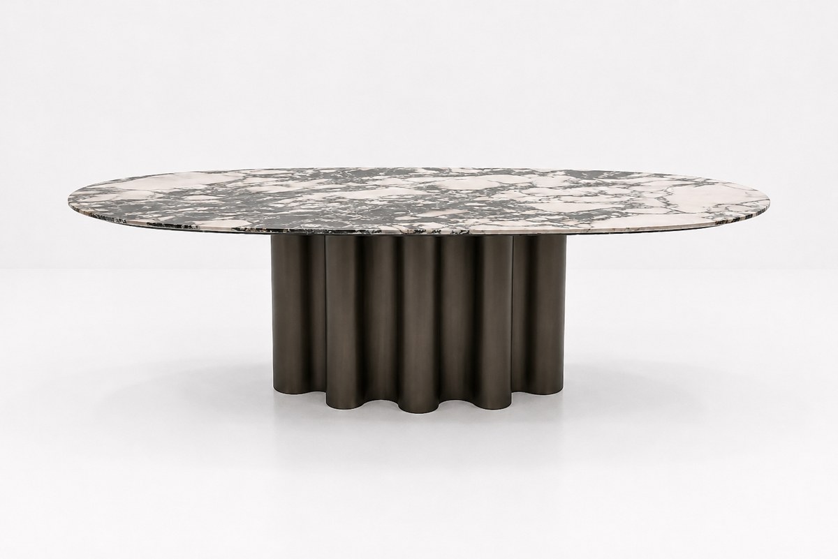 Oval veined dining table on fluted base